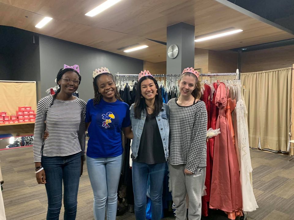 International Women's Association volunteers at prom dress giveaway